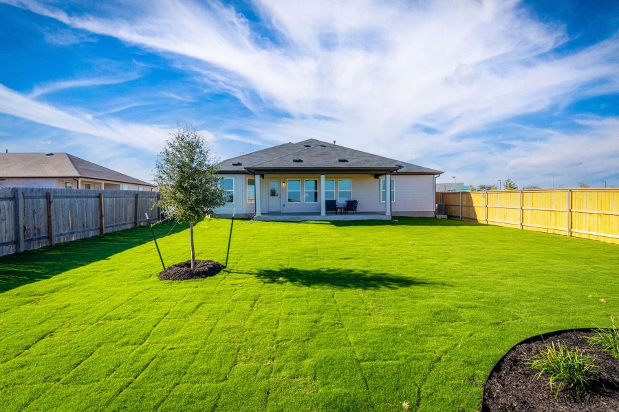 This is the back exterior of the Hawkins plan and is the model home in Carillon at 13305 Eppright Trace Blvd., Manor, TX. This is the back exterior of the Hawkins plan and is the model home in Carillon at 13305 Eppright Trace Blvd., Manor, TX.