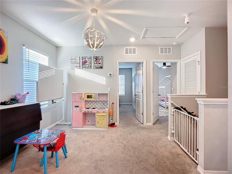 Furnished interior view inside a new home in Star Farms at Lakewood Ranch, Bradenton (Image 12).