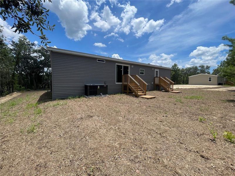 Front exterior of a new home in , Ocala, FL, highlighting curb appeal (Image 17).