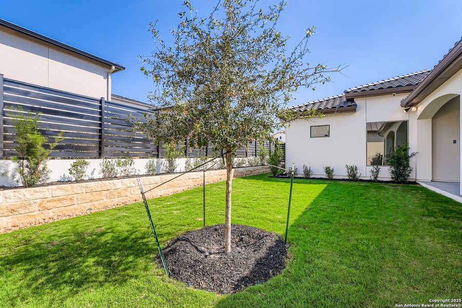 Exterior details and patio area of a home in The Bluff At The Dominion, San Antonio (Image 3).