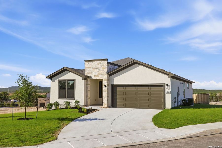 Front exterior of a new home in The Summit, San Antonio, TX, highlighting curb appeal (Image 30).