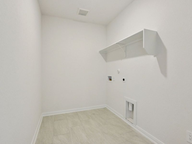 Laundry room in the Allen floorplan at a Meritage Homes community. Laundry room in the Allen floorplan at a Meritage Homes community.