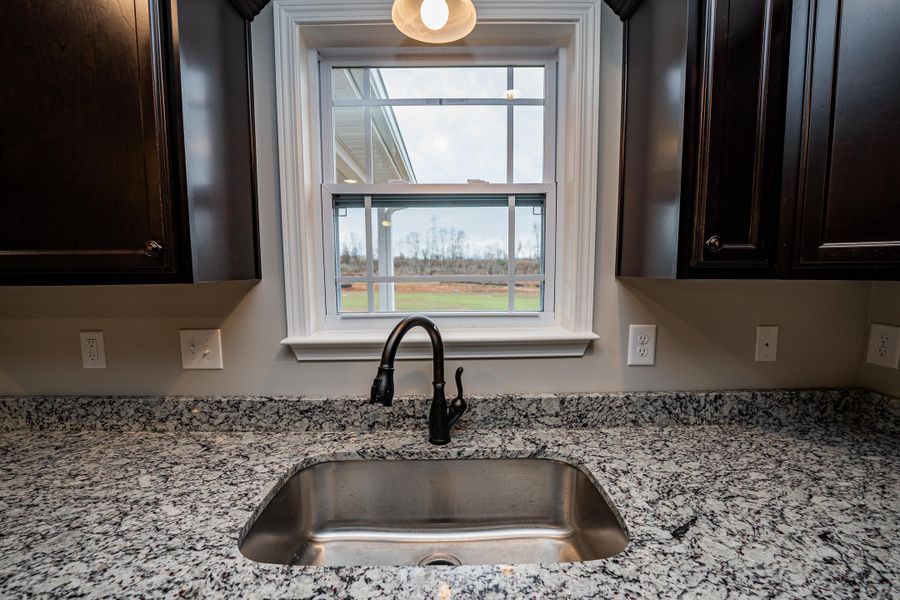 Representative interior finishes for a home built from the Saxon by Enchanted Homes in Guadalupe Heights, Seguin (Image 19).