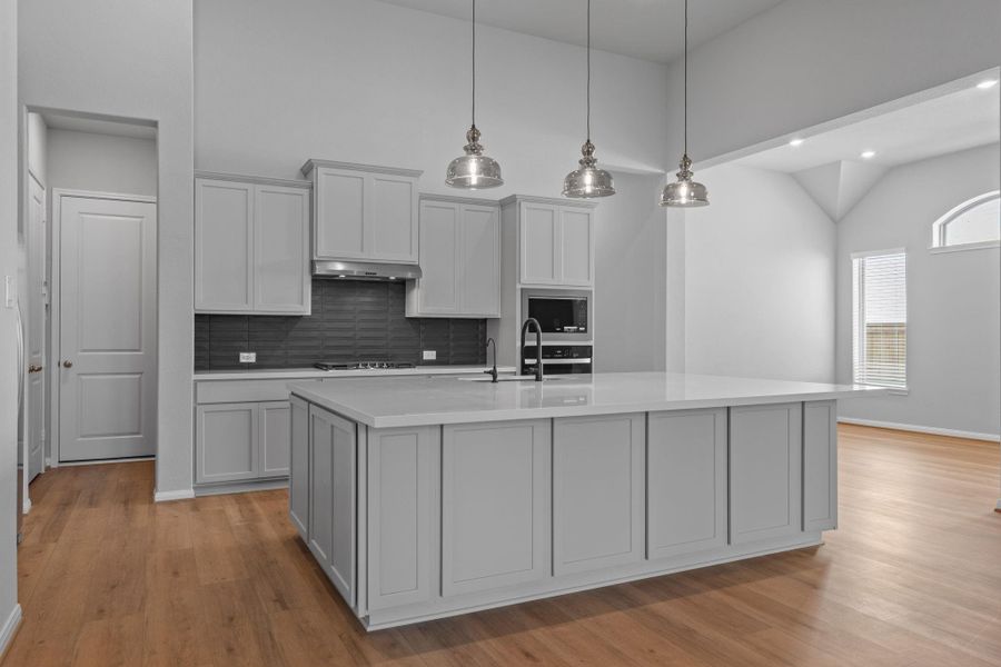 Furnished interior view inside a new home in Bridgeland 55', Cypress (Image 12).