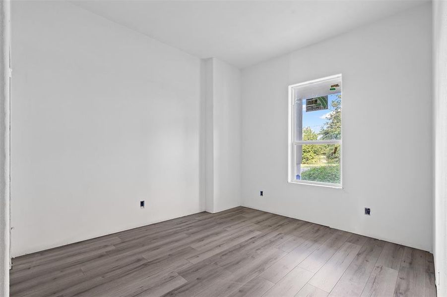 Empty room with wood finished floors Empty room with wood finished floors