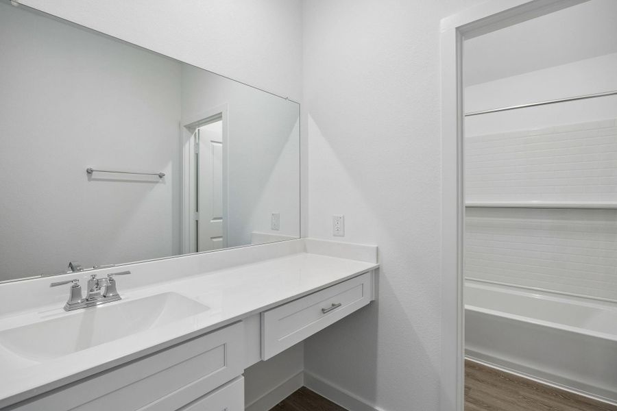 Furnished interior view inside a new home in Ellerden, Tomball (Image 9).
