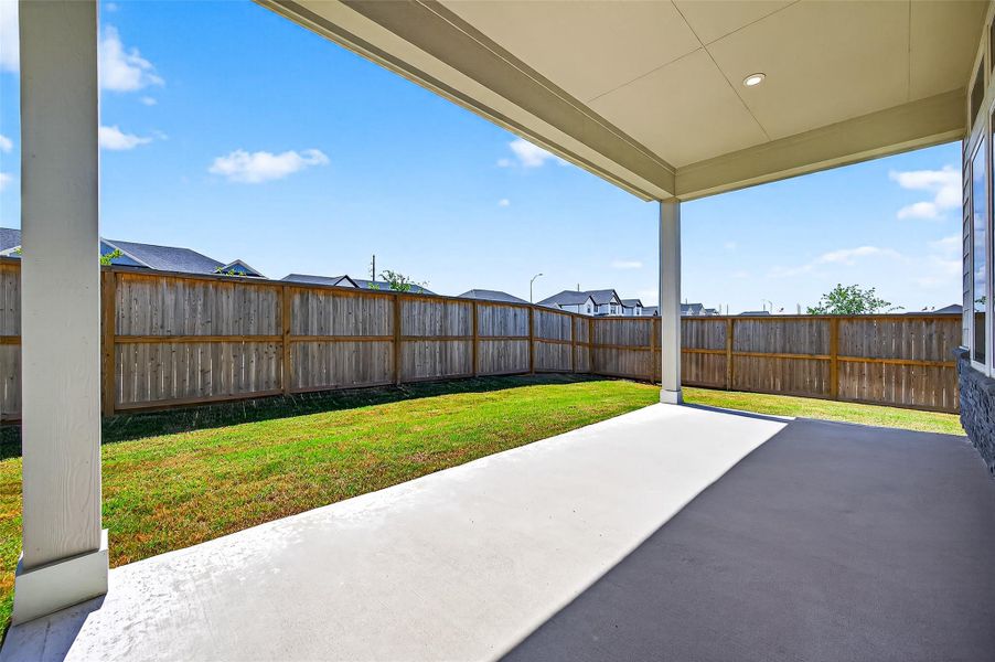 Exterior details and patio area of a home in Jordan Ranch: Signature Series, Katy (Image 22).