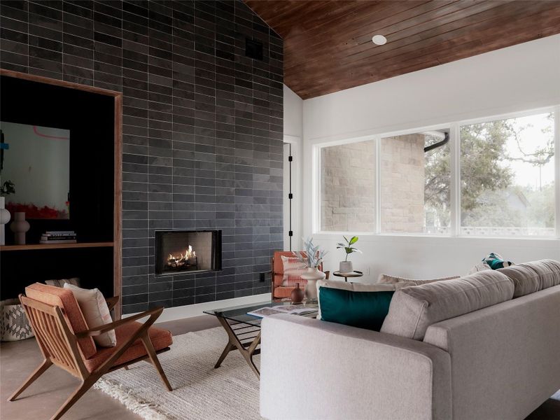 Authentic details like vaulted ceilings, stained concrete floors, terrazzo tiles and a slate wood-burning fireplace make this home a rare find for design enthusiasts and those seeking a one-of-a-kind property.