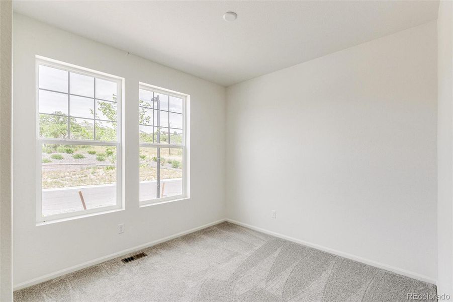 Spacious, unfurnished interior of a new home in Terrain Oak Valley, Castle Rock (Image 35).