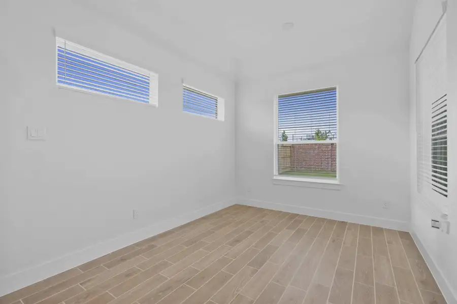 Spacious, unfurnished interior of a new home in Grange, Katy (Image 22).