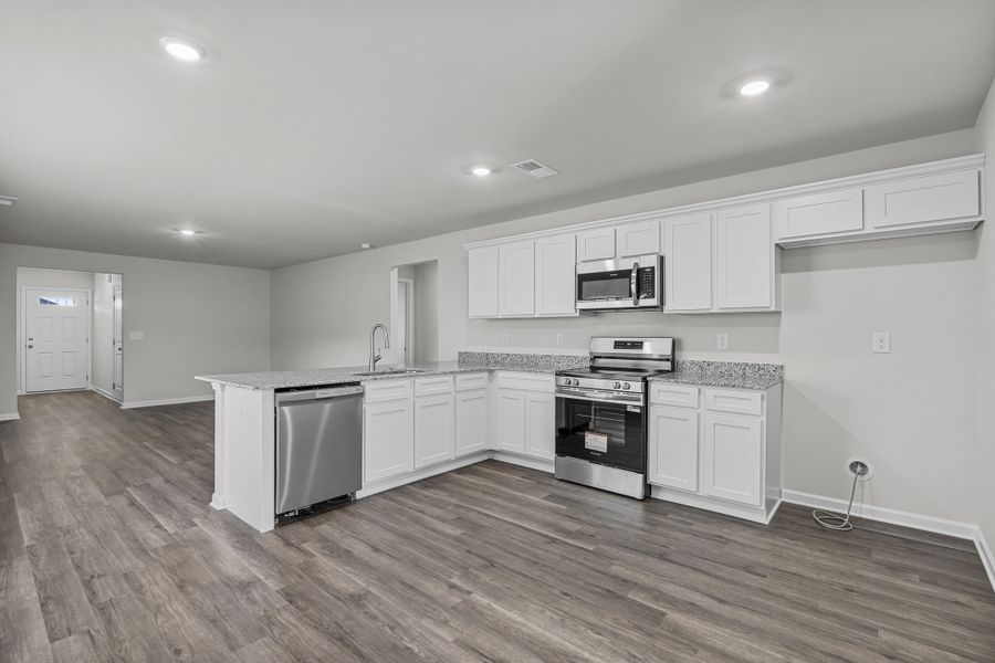 Representative furnished interior of a home built from the Holly A by McGuinn Homes in Willow Lake, Blythewood (Image 4).