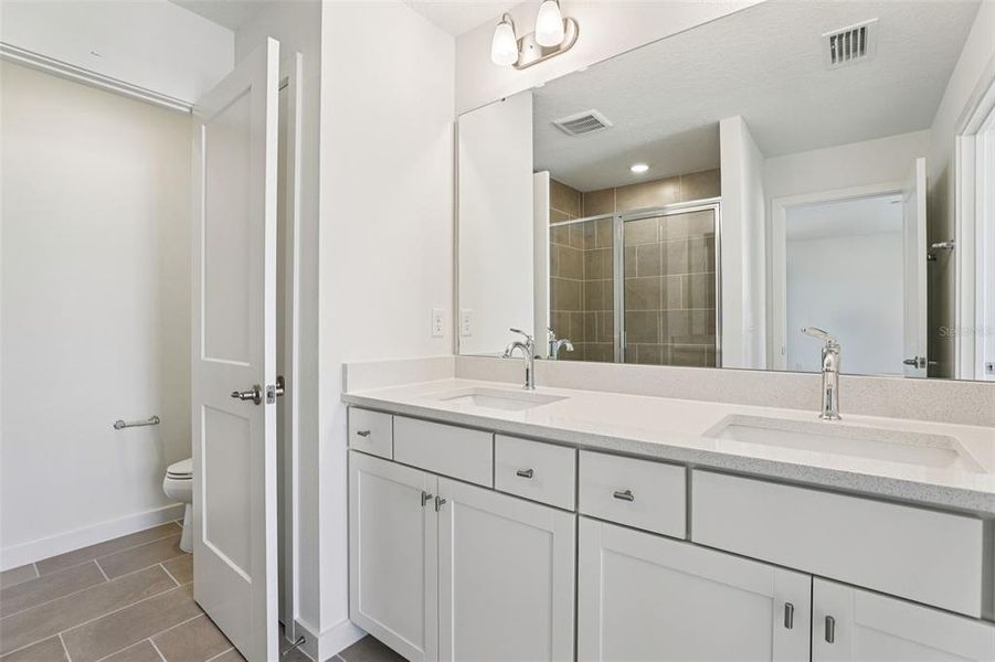 Furnished interior view inside a new home in Trinity Place, St. Cloud (Image 8).