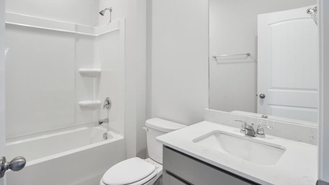 Furnished interior view inside a new home in Legacy Farms, White House (Image 9).