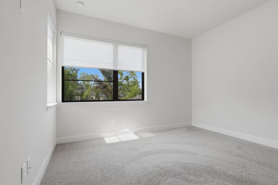 Spacious, unfurnished interior of a new home in Sienna, Missouri City (Image 41).