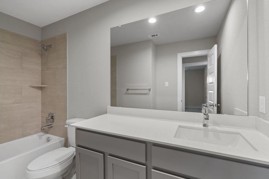 Furnished interior view inside a new home in Cypresswood Landing, Humble (Image 10).