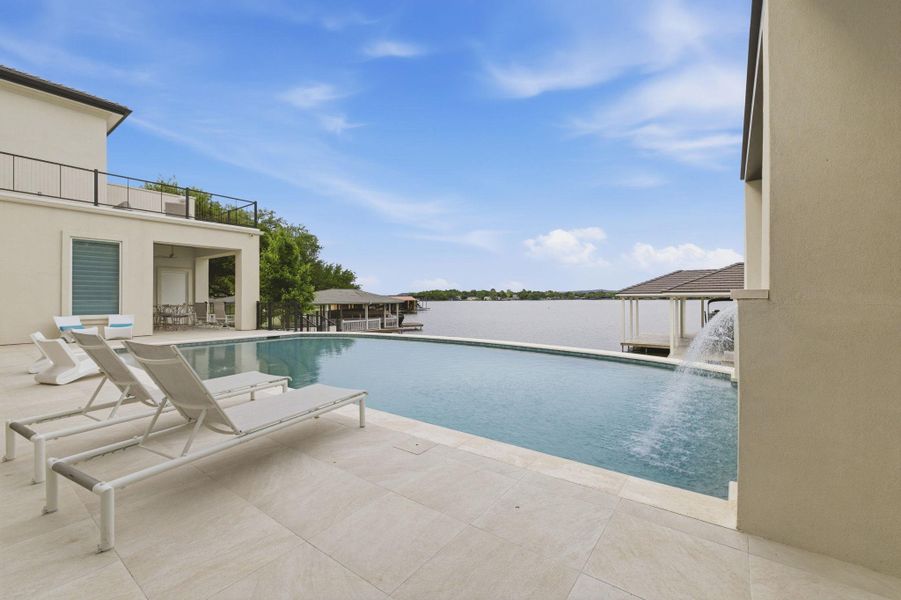 Swimming pool with a patio area