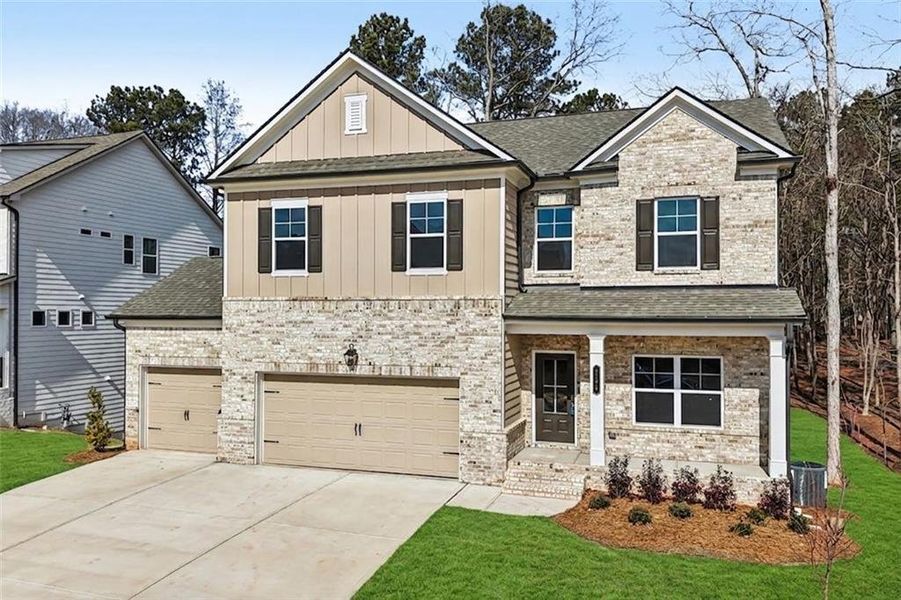 Front exterior of a new home in Rosewood Lake Estates, Hoschton, GA, highlighting curb appeal (Image 29). Front exterior of a new home in Rosewood Lake Estates, Hoschton, GA, highlighting curb appeal (Image 29).