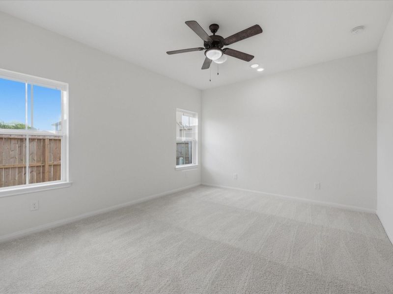 The spacious primary suite offers a peaceful retreat with privacy, comfort, and easy access to the main living spaces. The spacious primary suite offers a peaceful retreat with privacy, comfort, and easy access to the main living spaces.