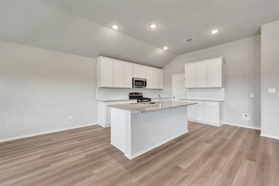 Furnished interior view inside a new home in Carillon, Manor (Image 7).