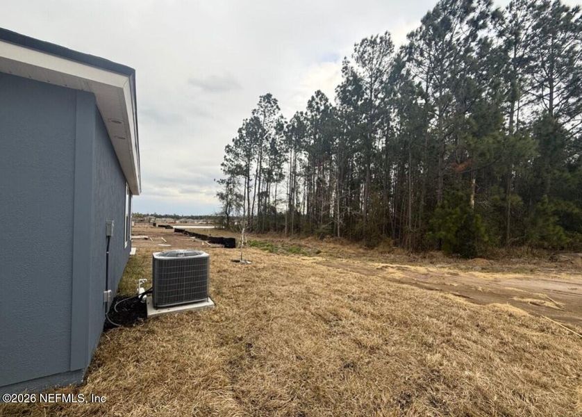 Exterior details and patio area of a home in The Arbors, Jacksonville (Image 4).