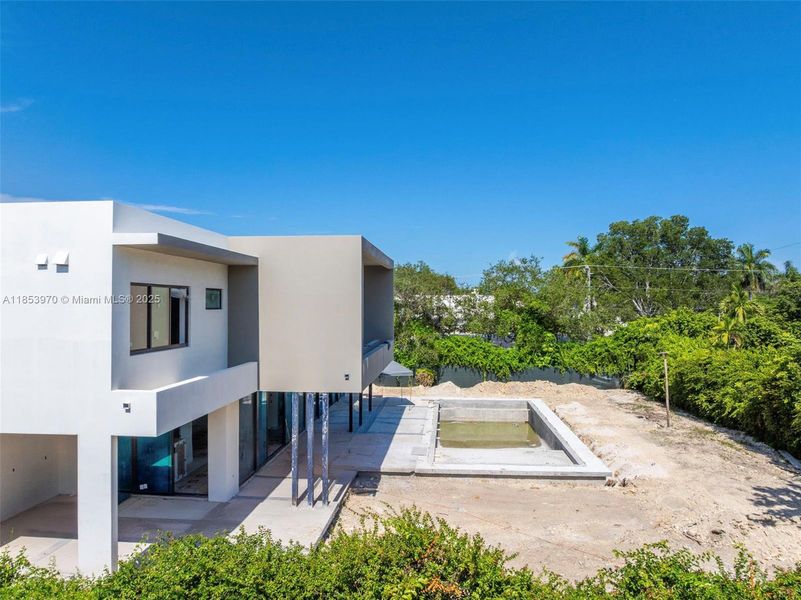 Front exterior of a new home in , Pinecrest, FL, highlighting curb appeal (Image 27). Front exterior of a new home in , Pinecrest, FL, highlighting curb appeal (Image 27).
