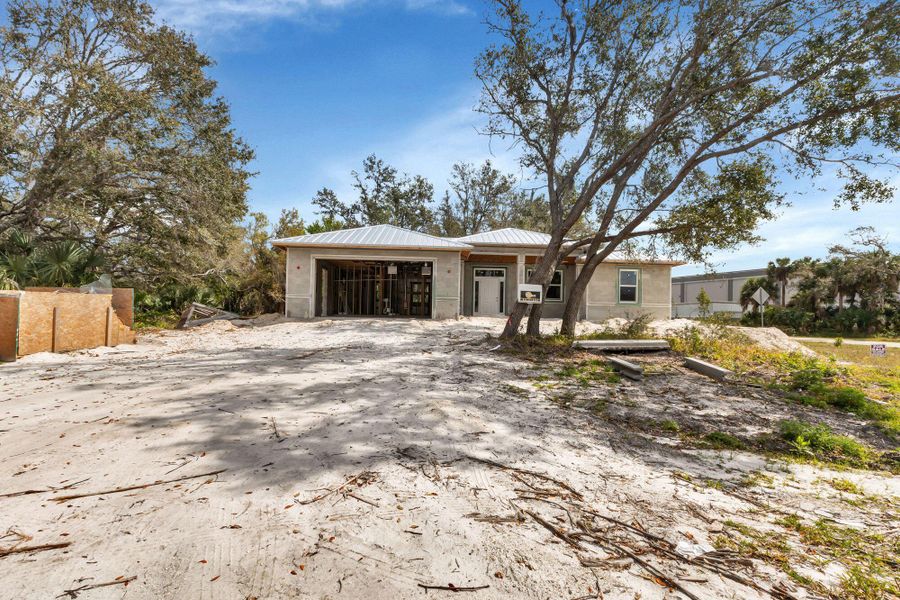 Front exterior of a new home in , Port Charlotte, FL, highlighting curb appeal (Image 8). Front exterior of a new home in , Port Charlotte, FL, highlighting curb appeal (Image 8).