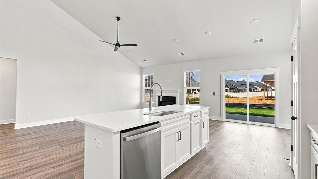 Memorable meals begin in this vibrant kitchen with a thoughtfully designed island Memorable meals begin in this vibrant kitchen with a thoughtfully designed island