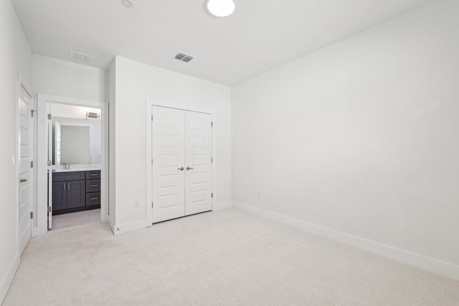 Spacious, unfurnished interior of a new home in Koenig Townhomes, Austin (Image 23).