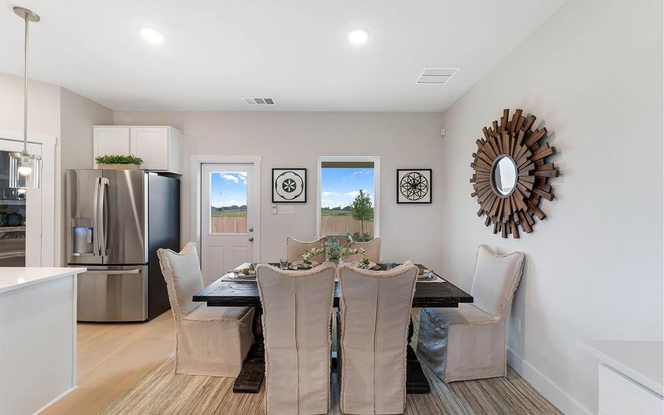 Furnished interior view inside a new home in Massey Oaks, Pearland (Image 8).