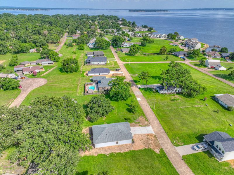 Front exterior of a new home in , Livingston, TX, highlighting curb appeal (Image 23).