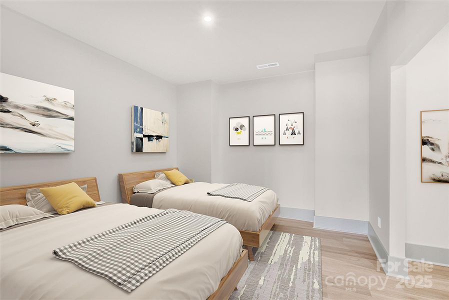 Virtually staged basement room can accommodate additional sleeping area Virtually staged basement room can accommodate additional sleeping area