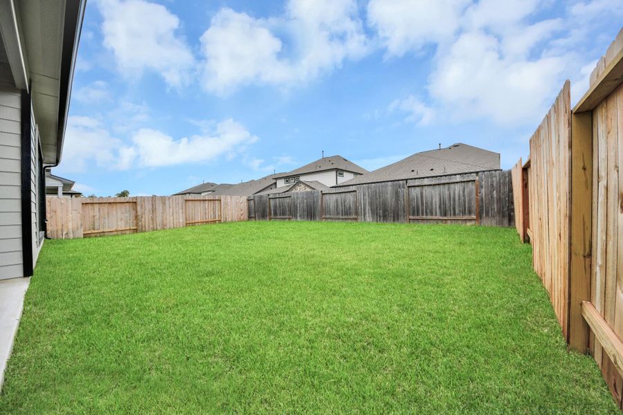 Come and see this spacious backyard with its beautiful covered patio. There is plenty of room for the kids to play and adults to relax. Perfect for your outdoor living space, patio furniture, bbq pit, and so much more. The possibilities are endless! Come and see this spacious backyard with its beautiful covered patio. There is plenty of room for the kids to play and adults to relax. Perfect for your outdoor living space, patio furniture, bbq pit, and so much more. The possibilities are endless!