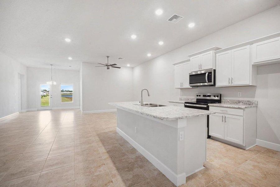 Open Conceot Kitchen facing Living room and lanai
