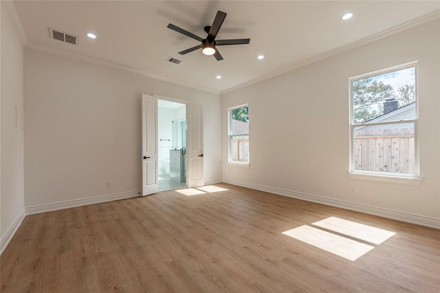 The primary bedroom also has recess lighting.