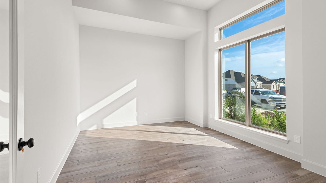 Spacious, unfurnished interior of a new home in Bridgeland, Cypress (Image 21).