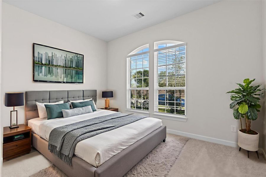 Virtually Staged – You will discover three Spacious bedrooms down that are filled with natural light, highlighted by tall windows and a neutral palette, perfect for both comfort and versatility.