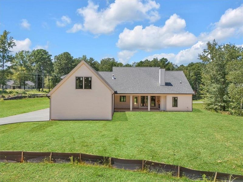 Front exterior of a new home in , Eatonton, GA, highlighting curb appeal (Image 24). Front exterior of a new home in , Eatonton, GA, highlighting curb appeal (Image 24).