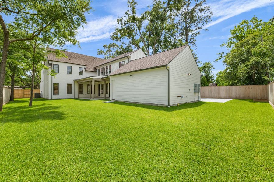 Exterior details and patio area of a home in , Houston (Image 4).