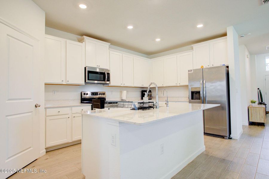 Furnished interior view inside a new home in , Green Cove Springs (Image 27).