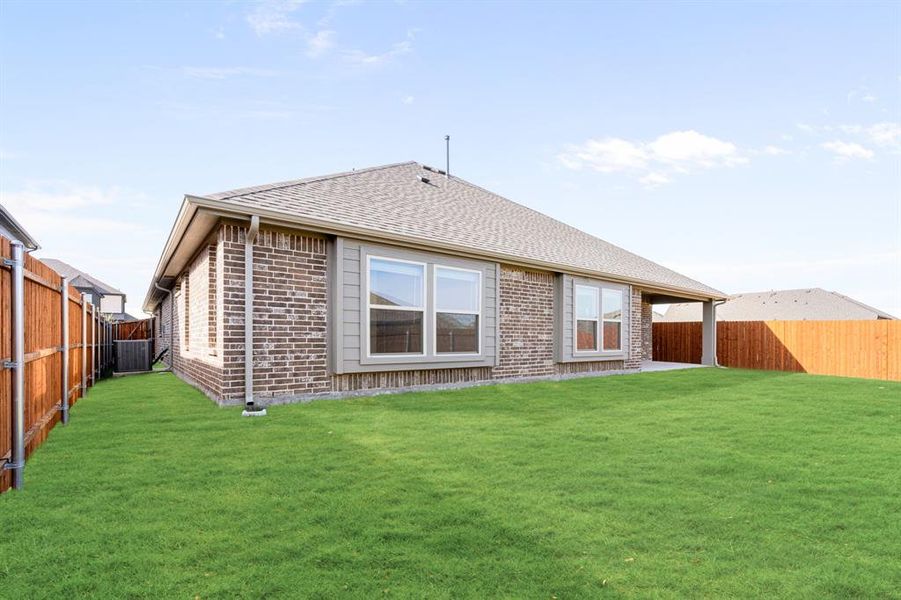 Exterior details and patio area of a home in Timberbrook, Justin (Image 4).