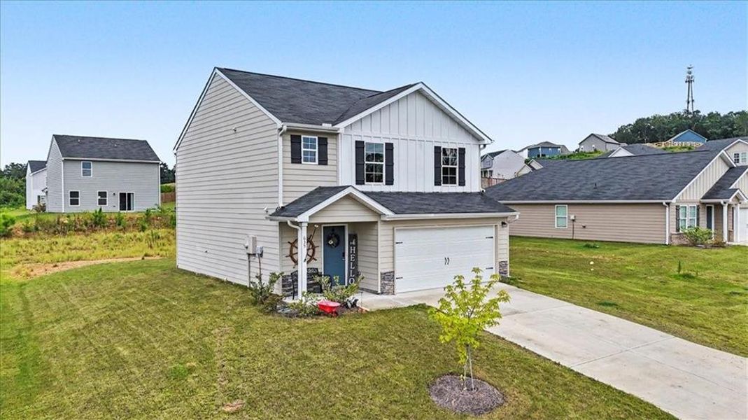 Front exterior of a new home in Kingston Park, Kingston, GA, highlighting curb appeal (Image 23).
