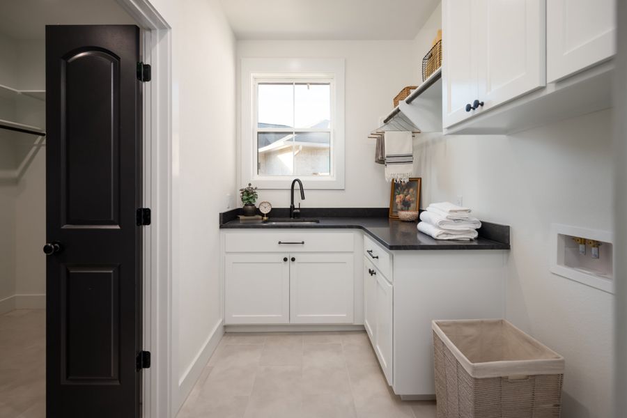 Furnished interior view inside a new home in Greens Prairie Reserve, College Station (Image 32).