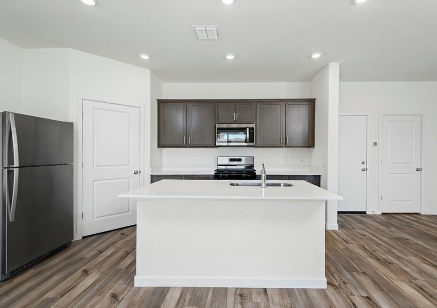 The kitchen has tons of countertop space for cooking all the meals for family and friends!