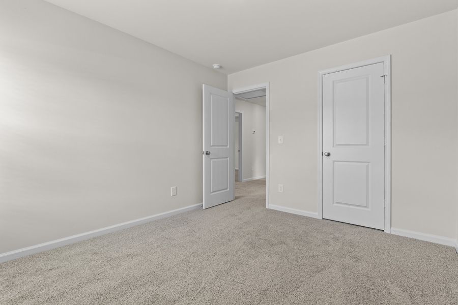 Representative unfurnished interior of a home built from the Cedar A by McGuinn Homes in Forts Ridge, Pelion (Image 19).