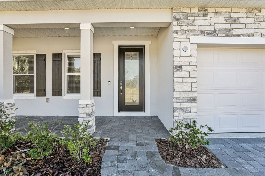 Exterior details and patio area of a home in Eagle Crest, Malabar (Image 2). Exterior details and patio area of a home in Eagle Crest, Malabar (Image 2).