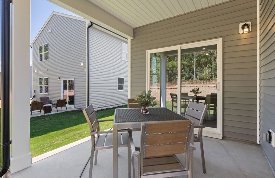 Exterior details and patio area of a home in Carpenter Falls, Durham (Image 3).