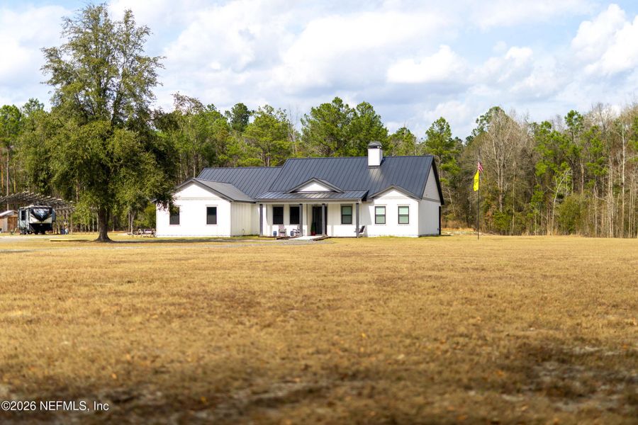 Exterior details and patio area of a home in , Jacksonville (Image 2). Exterior details and patio area of a home in , Jacksonville (Image 2).