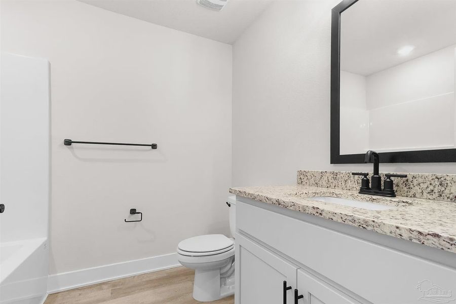 Furnished interior view inside a new home in Pecan Valley, Pensacola (Image 6).
