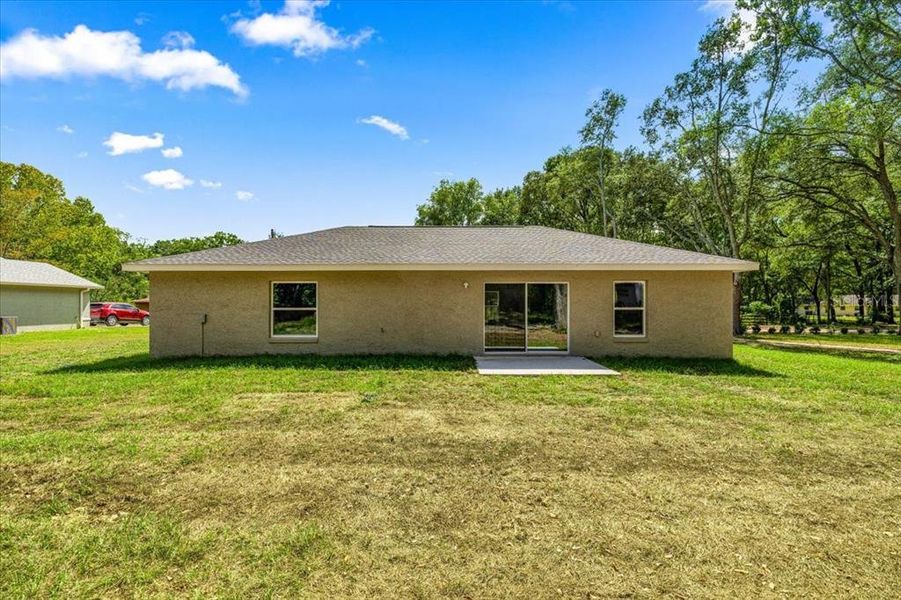 Exterior details and patio area of a home in , Ocala (Image 25).