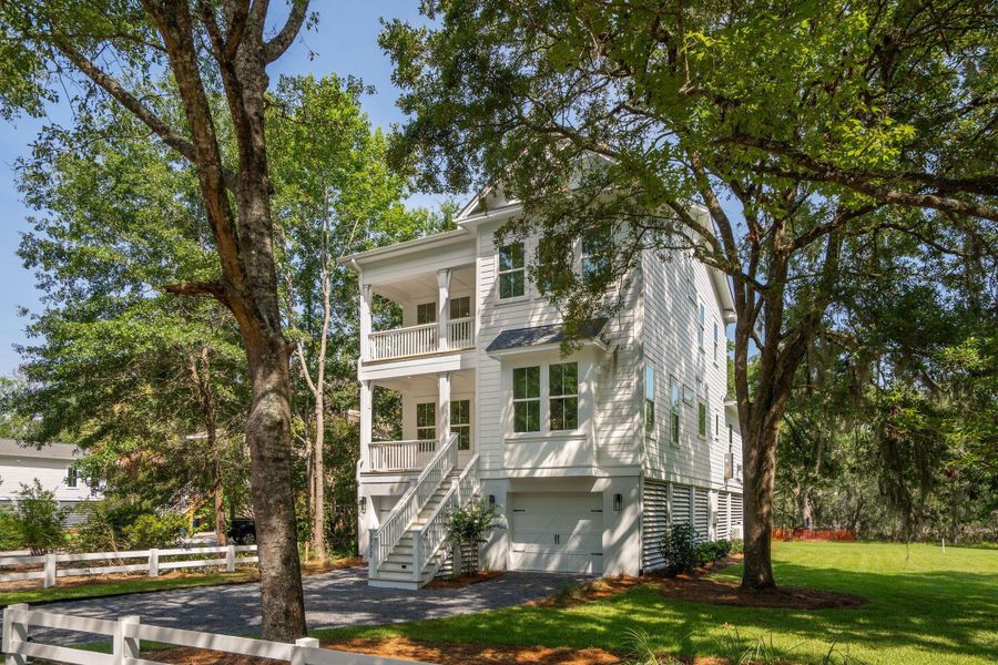 Front exterior of a new home in , Johns Island, SC, highlighting curb appeal (Image 30).